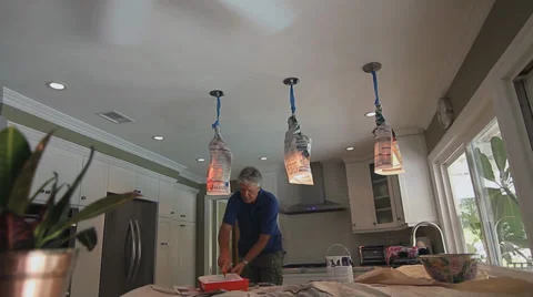 MAN PAINTING CEILING Stock Footage 28837305