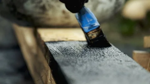 The man paints a board Stock Footage 63168974