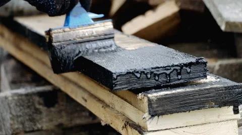 The man paints a board Stock Footage 63170318