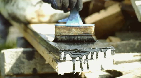 The man paints a board Stock Footage 63173533