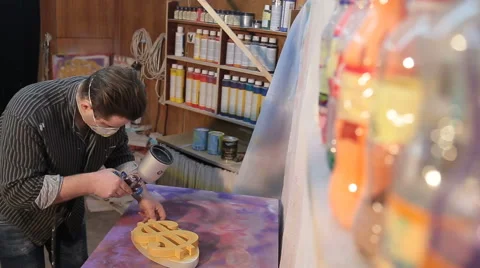 A Man Paints A Dollar Sign On The Table With Slide Stock-Footage 68838798
