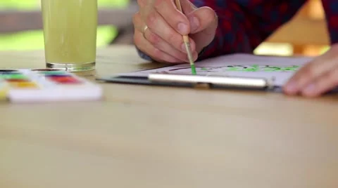 A Man Paints a Picture Stock Footage 67807718
