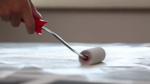 Man paints a picture with a roller. Stock Footage 255244249