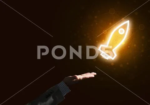 Man palm presenting Rocket web icon as technology concept Stock Photos