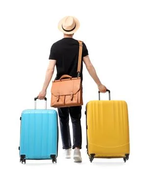 Man in panama hat with briefcase and two suitcases walking away travel and va Stock Photos