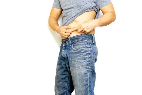 Man panic hand touching his fat belly isolated on white background. Stock Photos