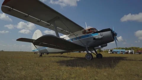 The man with a parachute goes to the plane Stock Footage 102370749