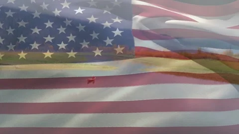 Man parachutist drifting under red canopy wind gusting clear flag waving across Video stock 333526465