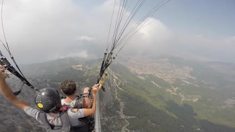 A man paragliding above the clouds. Stock-Footage 244799445