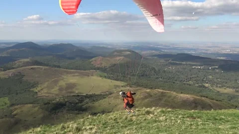 Man Paragliding Stock Footage 139399042