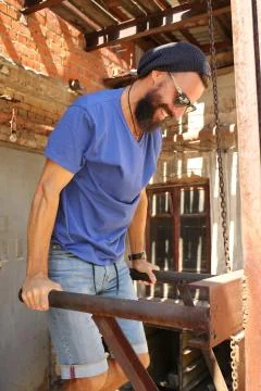 Man on parallel bars Stock Photos