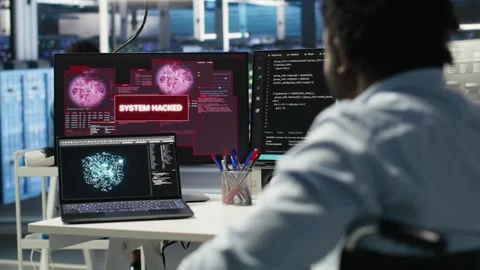 Man with paraplegia in server hub trying to protect hardware from hacker attack Stock Footage 309507549