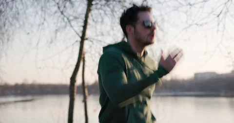 Man in park doing skipping drill Stock Footage 235681114