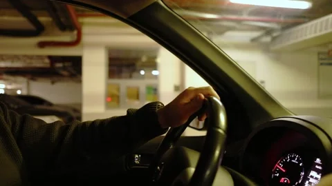 Man passing barrier in underground parking Stock Footage 148227259