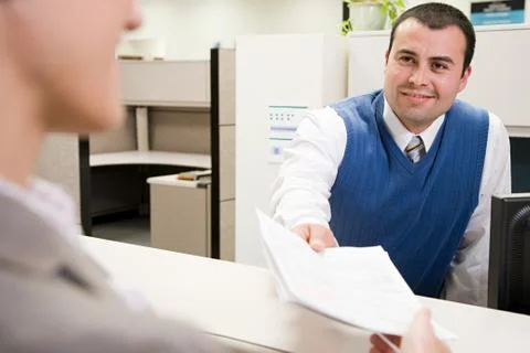 Man passing paper Stock Photos