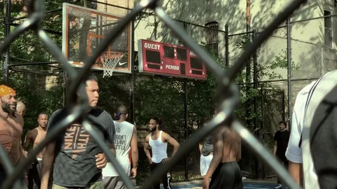 Man Patrick Ewing Georgetown jersey pickup basketball game West 4th street NYC Video stock 108355424