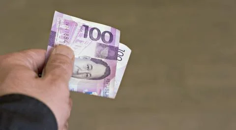 Man pay mpney Stock Photos
