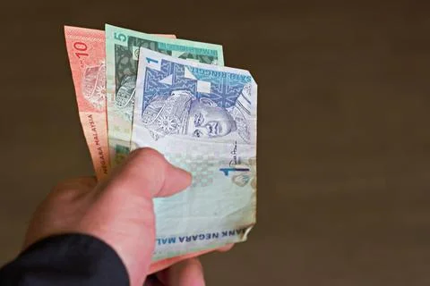 Man pay mpney Stock Photos