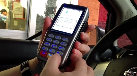 Man paying credit card inside car Stock Footage 46092535