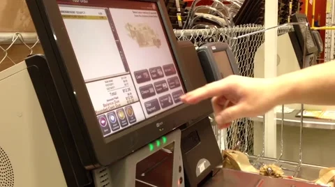 Man paying faucet connector at self checkout counter Stock Footage 52706232