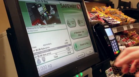 Man paying foods at self checkout counter Stock Footage 46163321