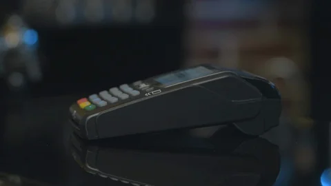 Man paying with NFC technology with smart phone credit card application in Video stock 107525577