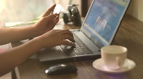 A man paying for online shopping using laptop and credit card. Stock Footage 60917799