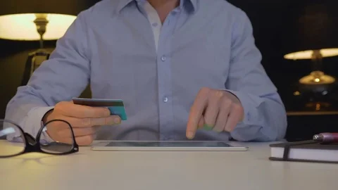 Man paying online with tablet Stock Footage 84333784