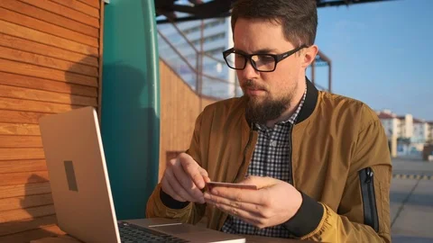 Man paying online using laptop. Stock Footage 105079917