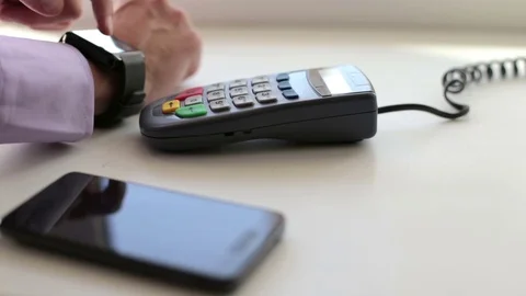 Man is Paying with a Smart Watch Stock Footage 71138988