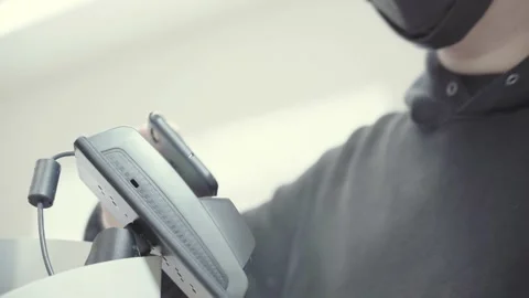 Man pays for purchases using a smartphone at the POS terminal Stock Footage 156840458