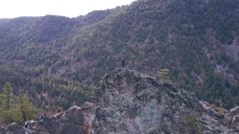 Man on Peak of Mountain 4 Video stock 292022909