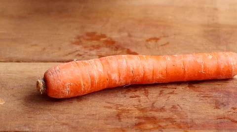 Man peeling carrots Stock Footage 45883927