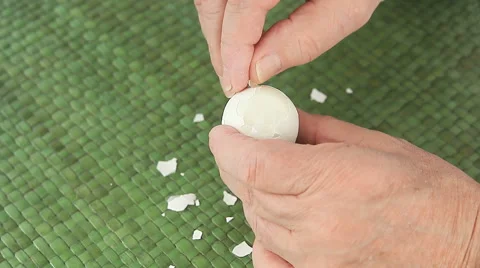 Man peels boiled egg Stock Footage 62510070