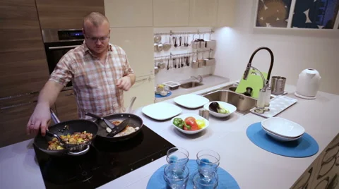 Man Pepares Dinner for Two Video stock 63649383
