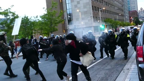 Man pepper sprayed many times while trying to walk away from brutal cops Stock Footage 137553595