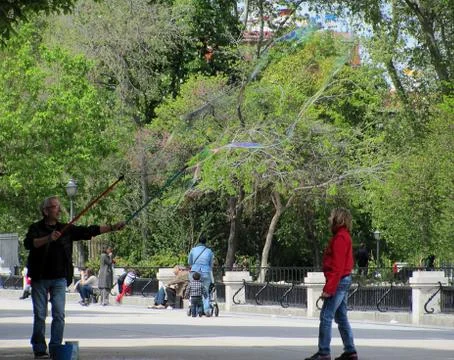 A man performance making big Soap bubbles in Retiro Park, Madrid Stock Photos