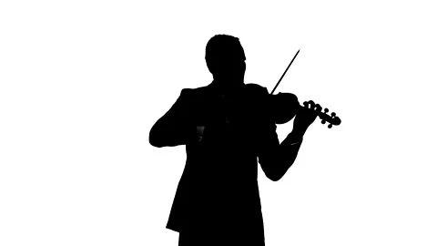 Man performing a beautiful composition on a classical violin. Silhouette Video stock 134522679