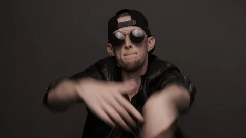 Man performing cool dance. Stylish man in glasses emotionally dancing Stock Footage 116375967