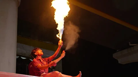 Man Performing Fire Stunt With Flame Thrower On Truck During Night Vídeo Stock 346587481