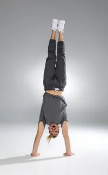 Man performing handstand Stock Photos