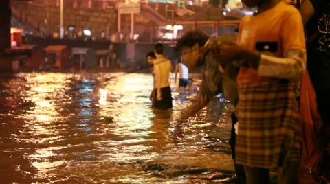 Man Performing Ritual at River Ganges Stock Footage 45832454