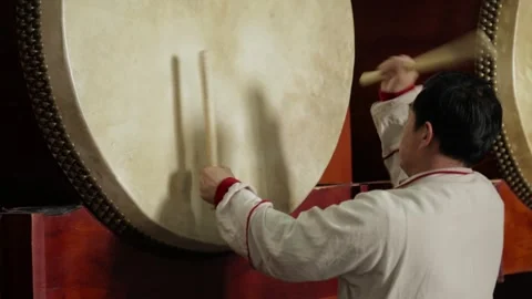 Man Performing Traditional Drum Routine at Drum and Bell Tower Beijing China Stock Footage 341712015