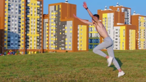 A man performs acrobatic elements Video stock 145708647