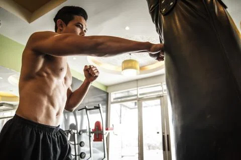 Man performs exercise - Boxing Stock Photos