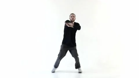 Man performs freestyle hand moves on white background Stock Footage 275548233