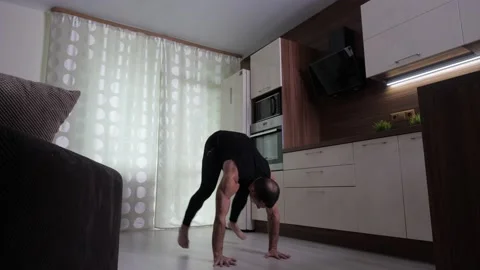 A man performs a functional training to strengthen and maintain endurance Stock Footage 131210232