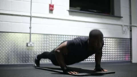 Man Performs Press Ups at Gym Stock Footage 61412051