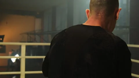Man performs shadow boxing simulating real fight in ring Stock Footage 306667370