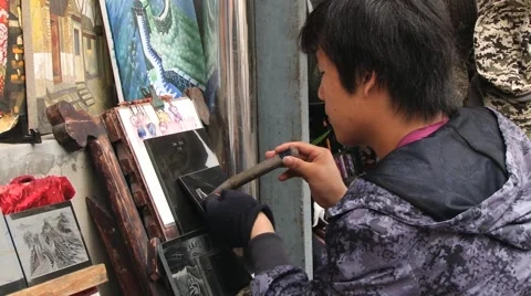 Man performs tile artwork in Mutianyu, China. Stock Footage 64918228